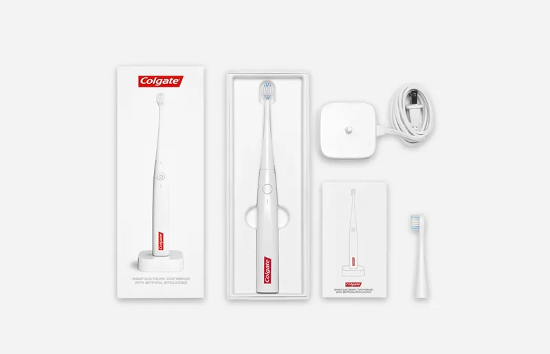 Colgate Smart Electric Toothbrush, directions, brush head, and charger