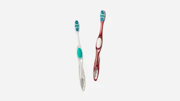 two colgate toothbrush